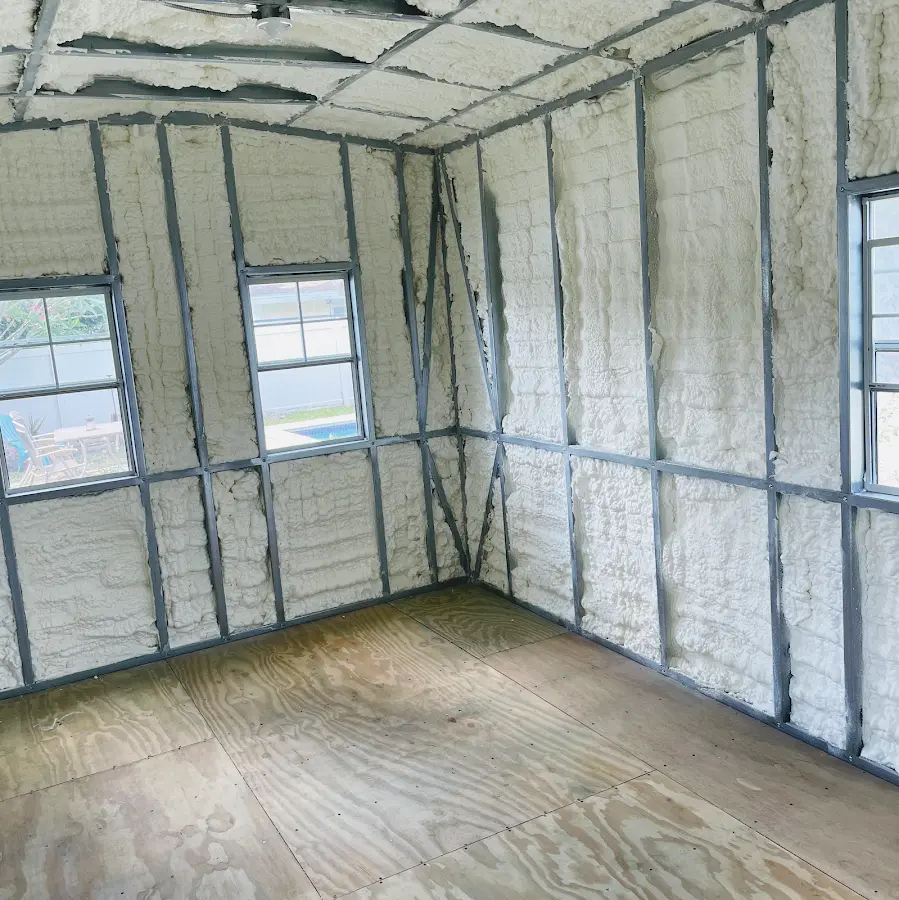 Closed-cell spray foam insulation applied to wall cavities in a residential project in Jonesboro